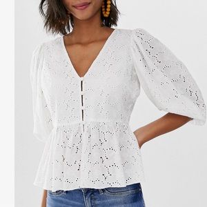 Floral embroidered peplum blouse